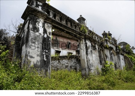 outdoor scene of the deserted and dilapidated colonial buildings. 