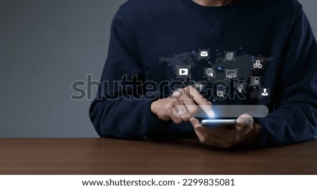 SEO Search Engine Optimization concept. Men use smartphone with SEO icons for promoting ranking traffic on websites and optimizing their websites to rank in search engines or SEO. Royalty-Free Stock Photo #2299835081