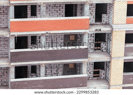 The walls of a multi-storey building under construction.
