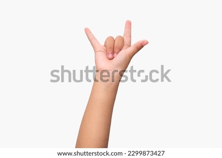 Asian girl hands Rock and Roll sign or giving devil horns gesture on white isolated background 