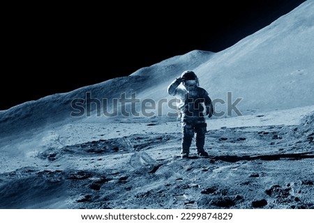 An astronaut explores the moon. Elements of this image furnishing NASA. High quality photo