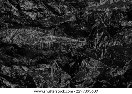 Black plastic bag texture background. Abstract background and texture for design.