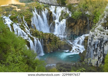 Waterfalls at Plitvice lakes national park in in Lika-Senj county, Croatia Royalty-Free Stock Photo #2299897657