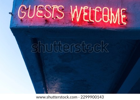 Guest Welcome Vintage Neon Sign in Reno Nevada.