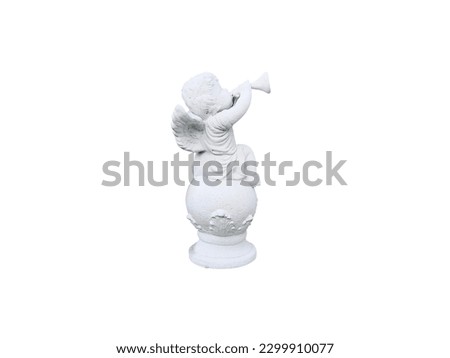 Cupid blowing a trumpet sits on a globe.