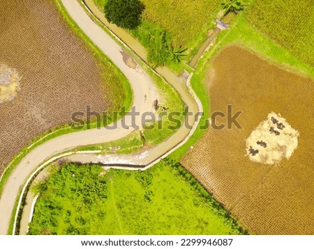 Aerial Photography. Bird's eye view from a drone flying over a winding road. Location place in Bandung Region - Indonesia
