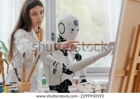Artist woman teaching painting to a humanoid AI robot, she is pointing at canvas and giving advice