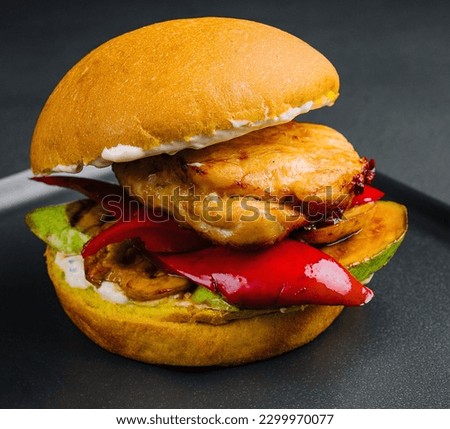 burger with chicken and grilled vegetables