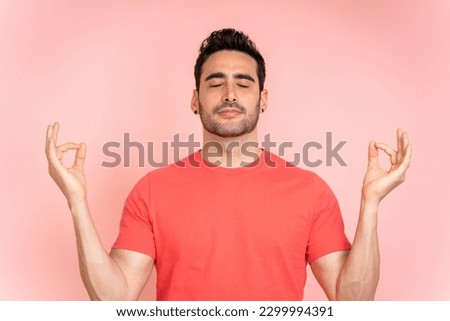 Man making mudra gesture with his hands.