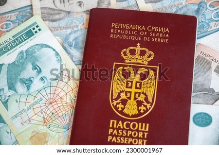 Serbian passport and Serbian dinar, Top view. Closeup.