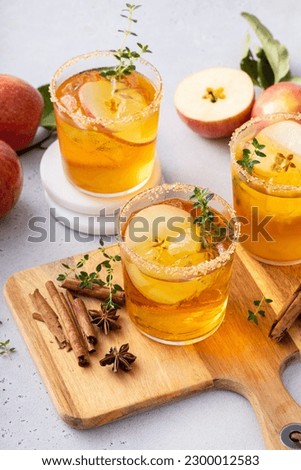Apple cider margarita with brown sugar, cinnamon and spices, fall cocktail idea