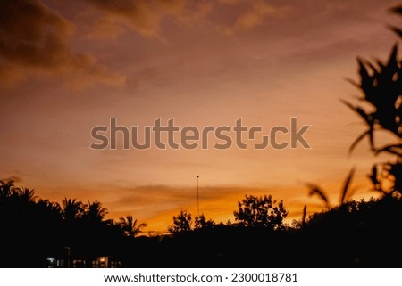 the atmosphere just before Maghrib in a housing  Royalty-Free Stock Photo #2300018781