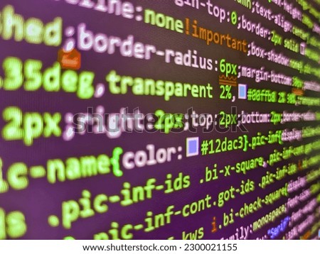 Program code PHP HTML CSS of site. Creative focus effect. Web software. Software developer programming code on black screen. Programmer working in computer screen.   Royalty-Free Stock Photo #2300021155