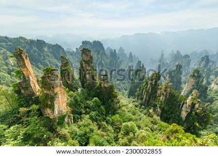 Awesome view of natural quartz sandstone pillars of the Tianzi Mountains (Avatar Mountains) in the Zhangjiajie National Forest Park, Hunan Province, China. Fabulous landscape. Royalty-Free Stock Photo #2300032855