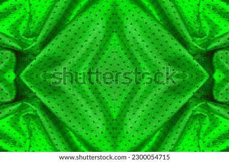 seamless. Fabric with a metallic sheen in small polka dots. Green color. Feel like a great designer with this brilliant emerald color! The graceful fabric is decorated with a seamless colloidoscope.