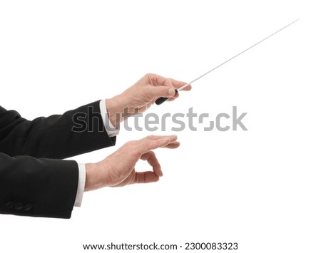Professional conductor with baton on white background, closeup Royalty-Free Stock Photo #2300083323