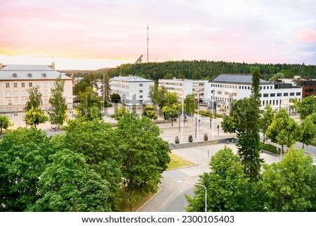 Kouvola, Finland. City centre with buildings, streets and trees. Beautiful cityscape of a Finnish town. Day or evening sunset in summer. Aerial panorama view. Travel and tourism in Kymenlaakso. Royalty-Free Stock Photo #2300105403