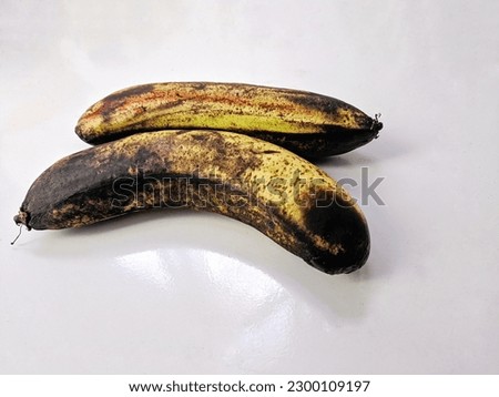 Two sweet ripe bananas taken from a close angle