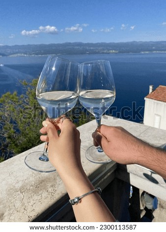 Glasses of wine. Romantic weekend. Sea view. Romantic. Sea view. Mountain View. 