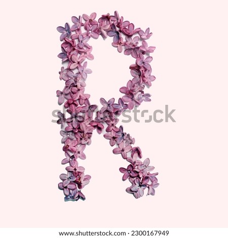 The letter R made of lilac flowers.  Square photo with white background.