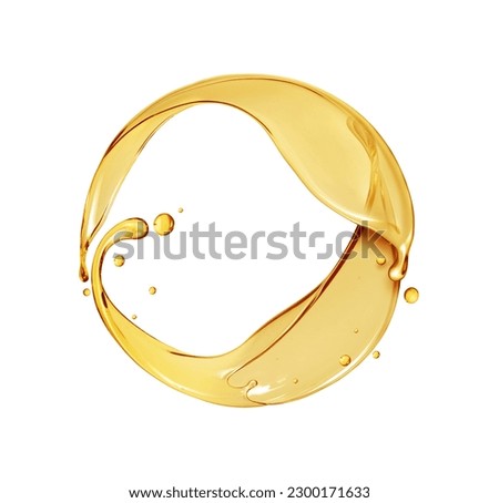 Splashes of olive or engine oil arranged in a circle isolated on a white background