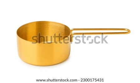 Metal measuring cup on white background Royalty-Free Stock Photo #2300175431
