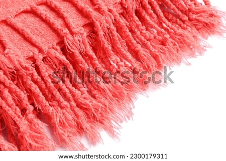 Red scarf on white background, closeup
