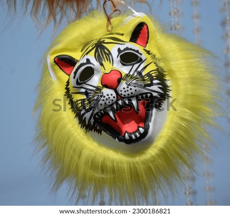 Face of a diffierent type of animal carnival mask, isolated on white background. Mask of the biggest cat,tiger,dog,moneky.Bengali festival pohela boishakh.