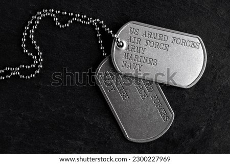 Old and worn military dog tags