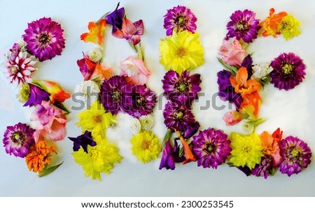 Sale word outlined with various summer fresh flowers Creative spring sale discount concept. Leaves from flowers. Advertising sticker of the store. Spring lettering decorative floral text