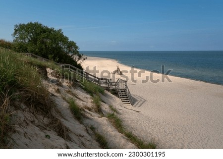 View of the Baltic Sea coast near the village of Morskoye on the Curonian Spit on a sunny summer day, Kaliningrad region, Russia Royalty-Free Stock Photo #2300301195
