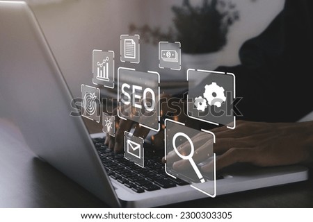 SEO,Search Engine Optimization Marketing Ranking Traffic Website Internet Business Technology Concept.Seo Career.Businessman using laptop to analysis SEO.
