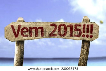 2015 Coming!!! (In Portuguese) sign with a beach on background
