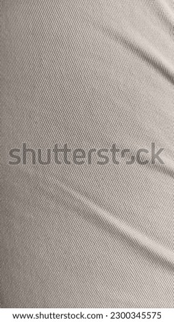 The texture of chino pants with a calm color Royalty-Free Stock Photo #2300345575
