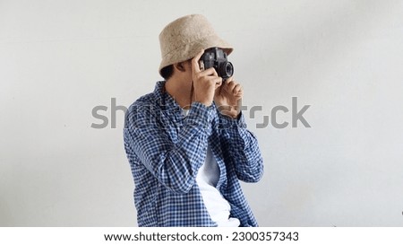 photographer take pictures Snapshot with camera. Concept for photography articles.