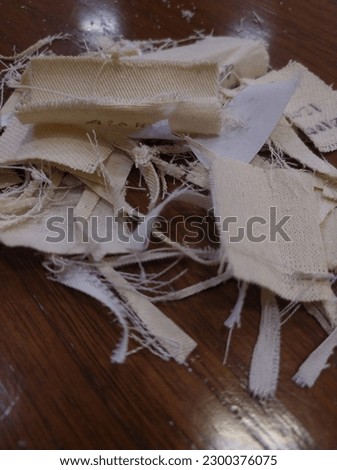 waste of textile after being cut to small pieces