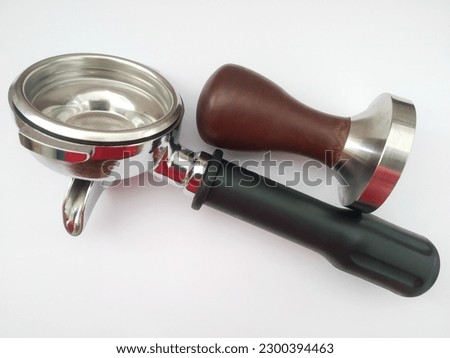 set of portafilter and tamper coffee maker tools isolated white background
