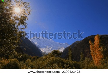 Glowing sun in early fall, World Tallest mountain in terms of Snow, Rakaposhi (7788m) in background