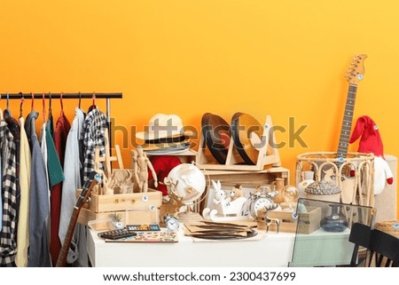 Many different items in room. Garage sale Royalty-Free Stock Photo #2300437699