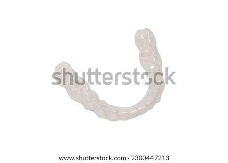 Transparent mouth guard isolated on a white background. 