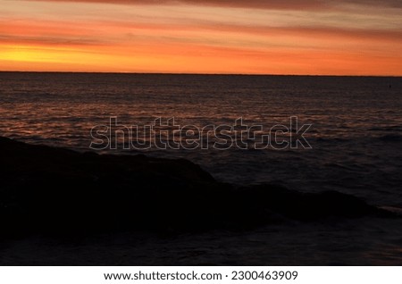 Panoramic view of a beautiful sunset over the sea. Nature and summer concept.