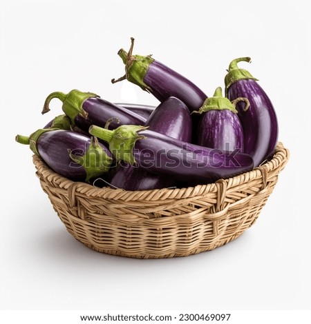 Organic Eggplants in a Basket on White Background Royalty-Free Stock Photo #2300469097