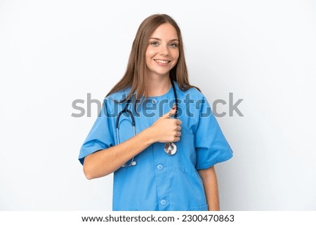 Young surgeon doctor Lithuanian woman isolated on white background giving a thumbs up gesture
