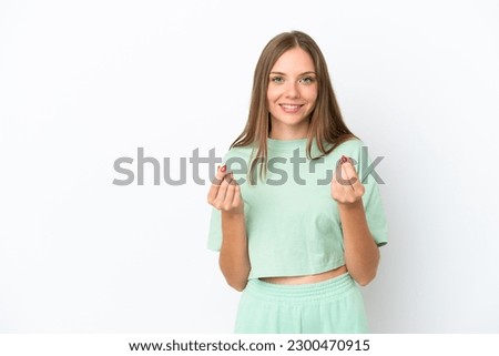 Young Lithuanian woman isolated on white background making money gesture