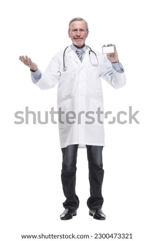 Senior doctor showing business card and thumbs up