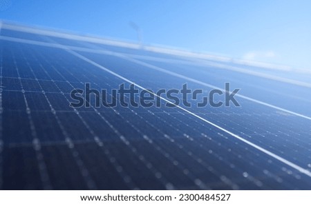 Wide angle concept photo with some big solar panels. Photovoltaic electrical energy industry, eco friendly way to produce electricity from sun.