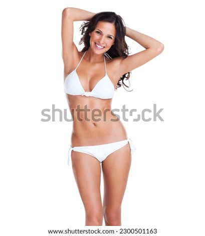 Skincare, portrait of happy woman in bikini and in a white background. Self care or happiness, dermatology or skin treatment and isolated confident young female model in underwear on studio backdrop Royalty-Free Stock Photo #2300501163