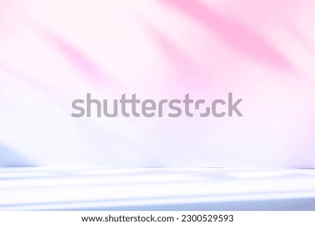 Abstract pink color gradient studio background for product presentation. Empty room with shadows of window and flowers and palm leaves .  Summer concert. Blurred backdrop. Royalty-Free Stock Photo #2300529593