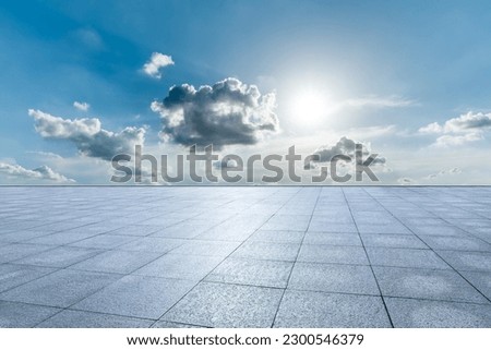 Empty square floor and sky clouds background