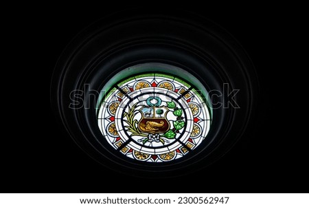 Stained glass window of the Peruvian shield in the cathedral of Tacna, Peru